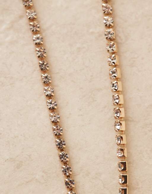 DesignB London - Orecchini pendenti dorati con decorazione di strass, 2 di 3