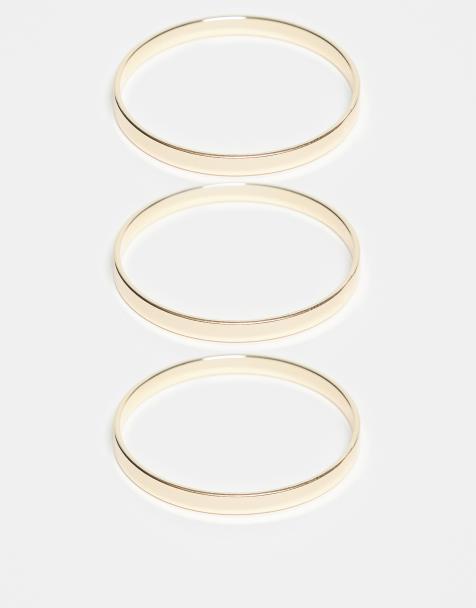 DesignB London pack of 3 stacking bangle bracelets in gold - view 1
