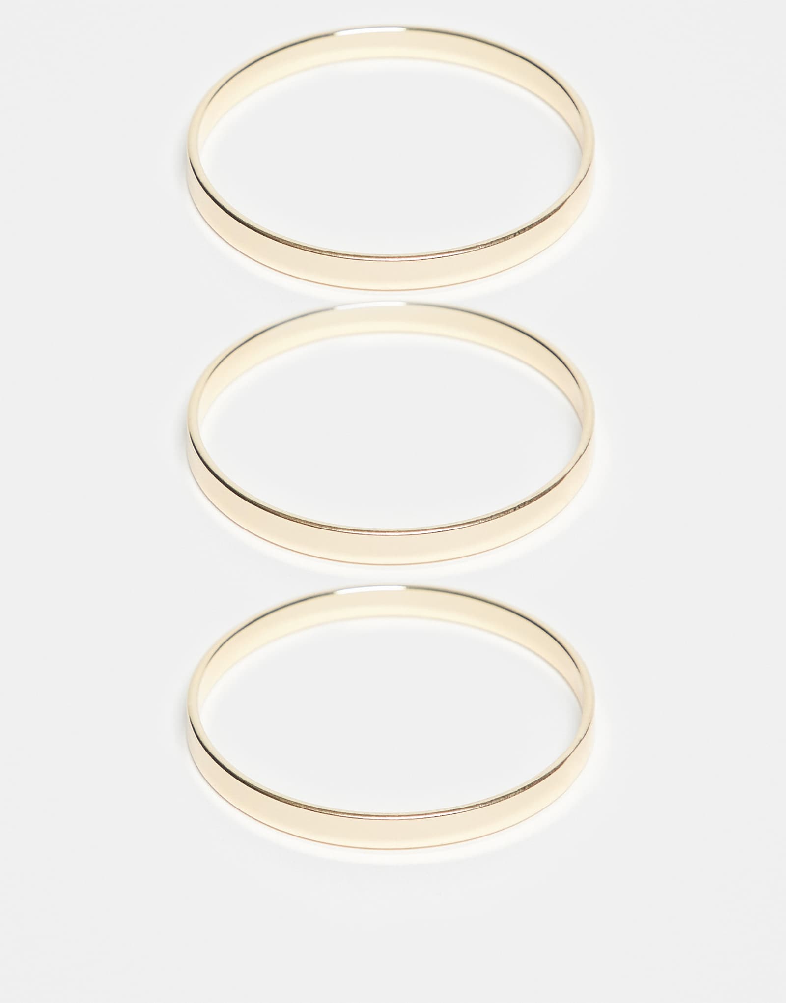DesignB London - набор из 3-х золотых браслетов в виде стопки
