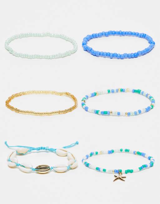 DesignB London - Set van 6 armbanden met kralen en zeesterrenbedeltjes in blauw en goud