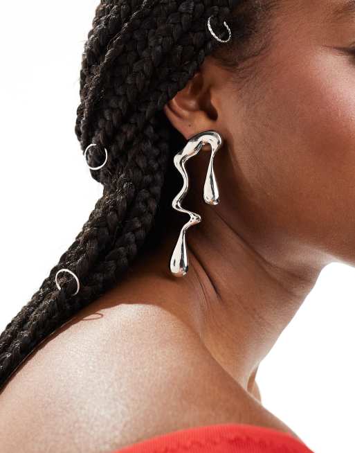 DesignB London - Statement oorknopjes met gesmolten vorm in zilver