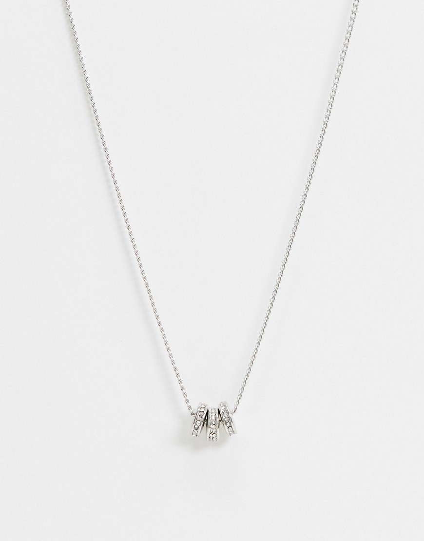 DesignB – Silverfärgat halsband med glashänge som snurrar
