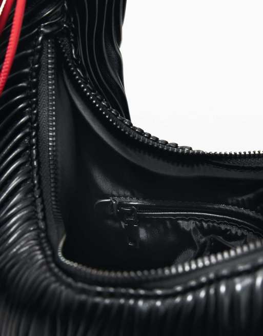 Desigual - Bolso mediano en relieve negro, 3 de 4