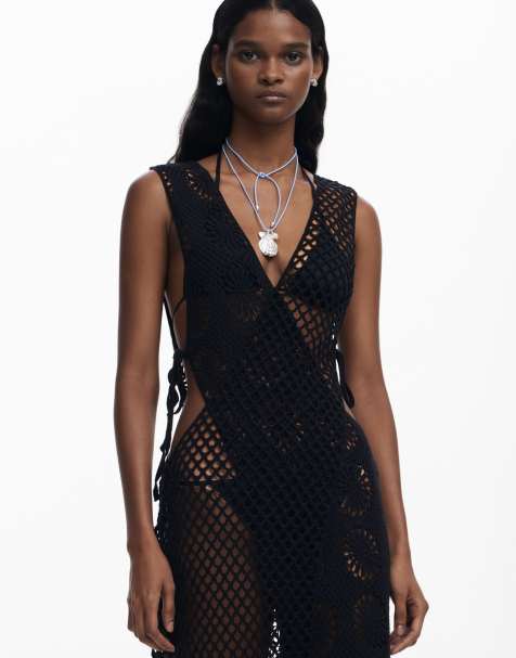 black crochet festival dress Black Paradise Crochet Maxi Dress