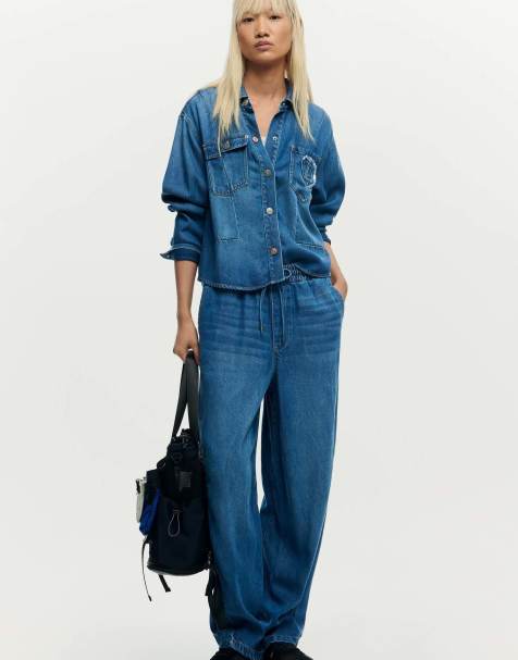Desigual Elastic long denim trousers in blue - view 1