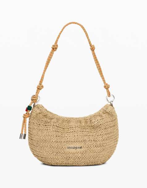 Desigual Medium oval raffia bag with charms in beige - view 1