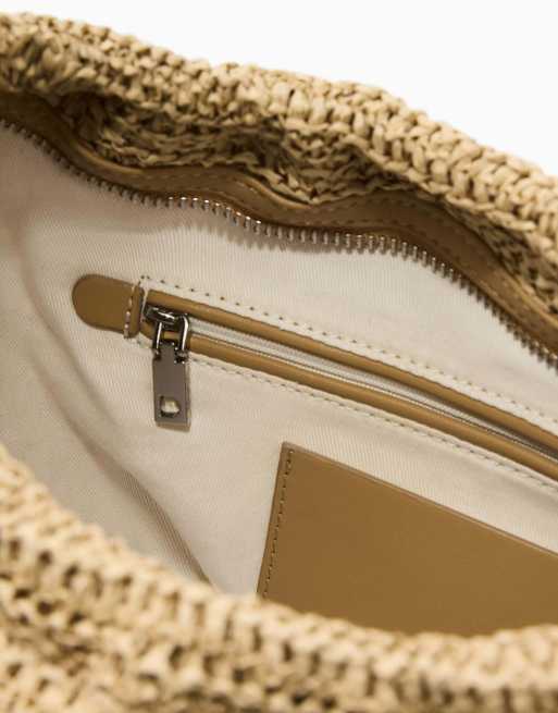 Desigual Medium oval raffia bag with charms in beige, 3 of 4