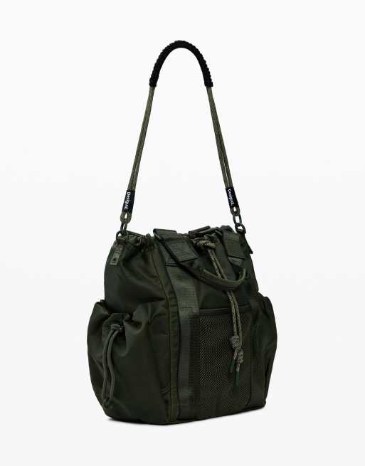 Desigual - Mochila verde multiposición con acabado encerado