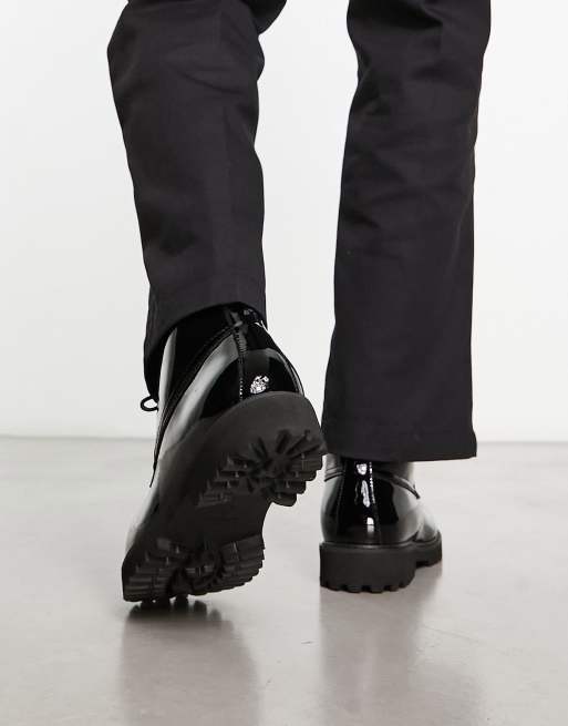 Devil's Advocate chunky patent leather lace up boots in black ASOS