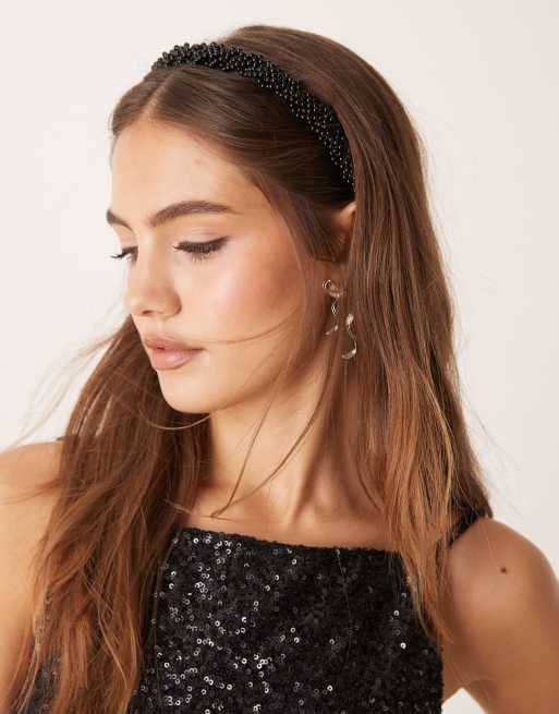 Diadema negra con diseño retorcido de perlas sintéticas de Gina Tricot
