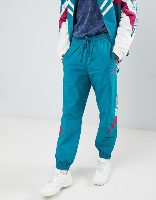 Diadora â Sport-Jogginghose im Bahnendesign, MVB in Grün | ASOS