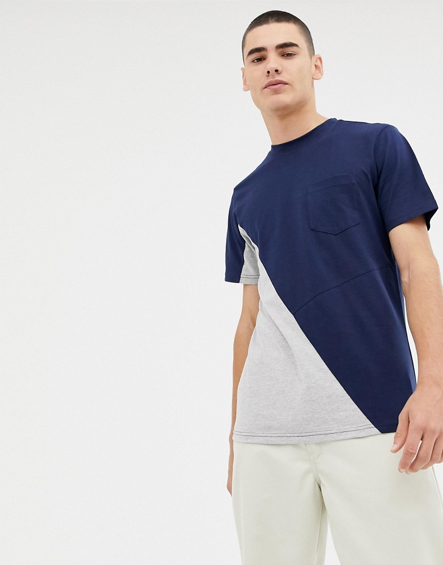Diagonalt skåret, tofarvet t-shirt med lomme fra Another Influence-Marineblå
