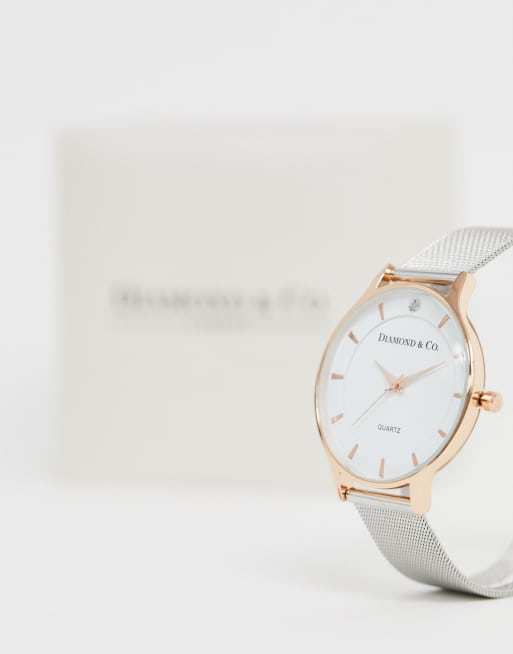 Diamond Co. rose gold case watch with real diamond at index