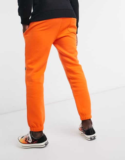 Bright orange online joggers