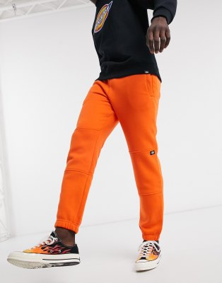 bright orange sweatpants