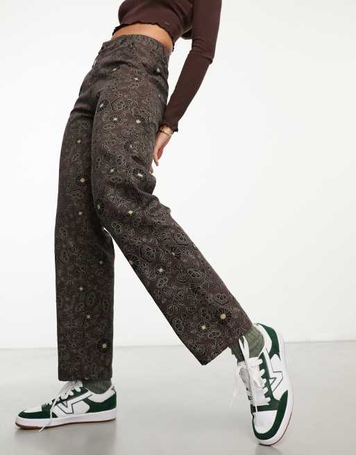 Dickies Ellis pants with floral all over print in dark brown