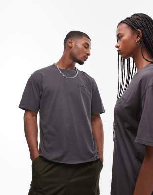 Dickies - T-Shirt in Schwarz mit kleinem, farblich abgestimmtem Western-Logo im Seil-Design