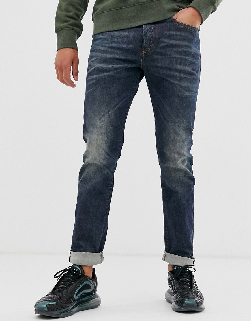 Diesel Buster regular slim fit jeans in 084ZU dark wash-Blue