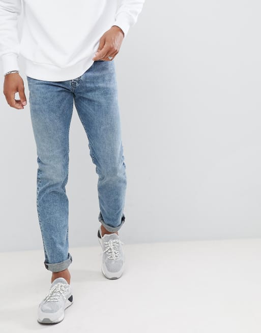 Diesel – Buster – Schmale Jeans in normaler Passform in 084UX
