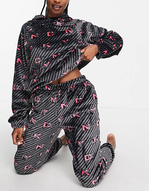 Loungewear DKNY cosy sherpa hoodie and jogger set in all over black + pink logo print 