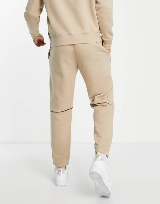 DKNY Sport printed logo joggers in brown