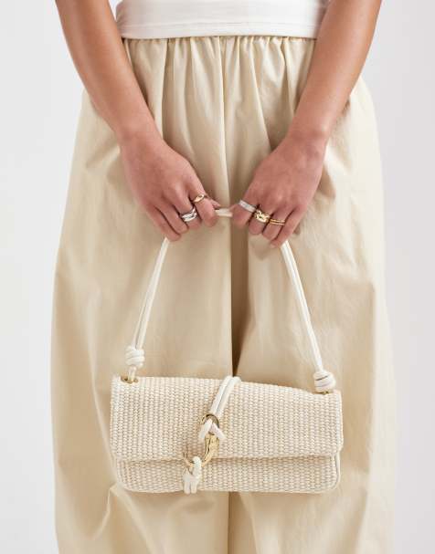 Dolce Vita Alice woven shoulder bag with gold hardware in cream - view 1