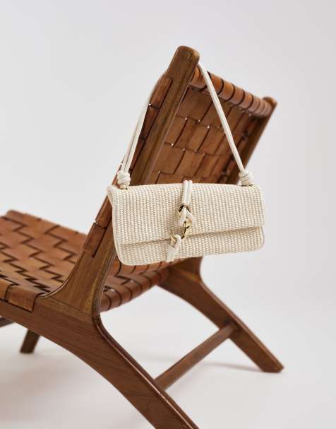 Dolce Vita Alice woven shoulder bag with gold-tone hardware in cream - view 1