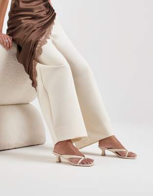  Brevel strappy low heel sandals in off-white leather