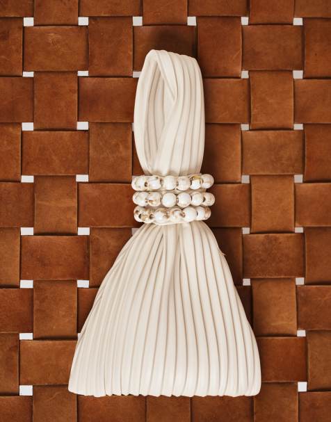 Dolce Vita Carey clutch purse with resin detailing in ivory - view 1