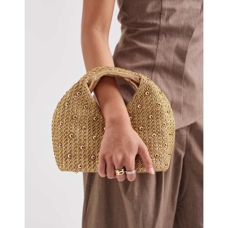 Dolce Vita Dahlia raffia clutch purse with studs in gold | ASOS
