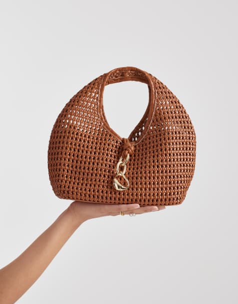 Dolce Vita Dahlia woven clutch purse with gold-tone hardware in tan - view 1