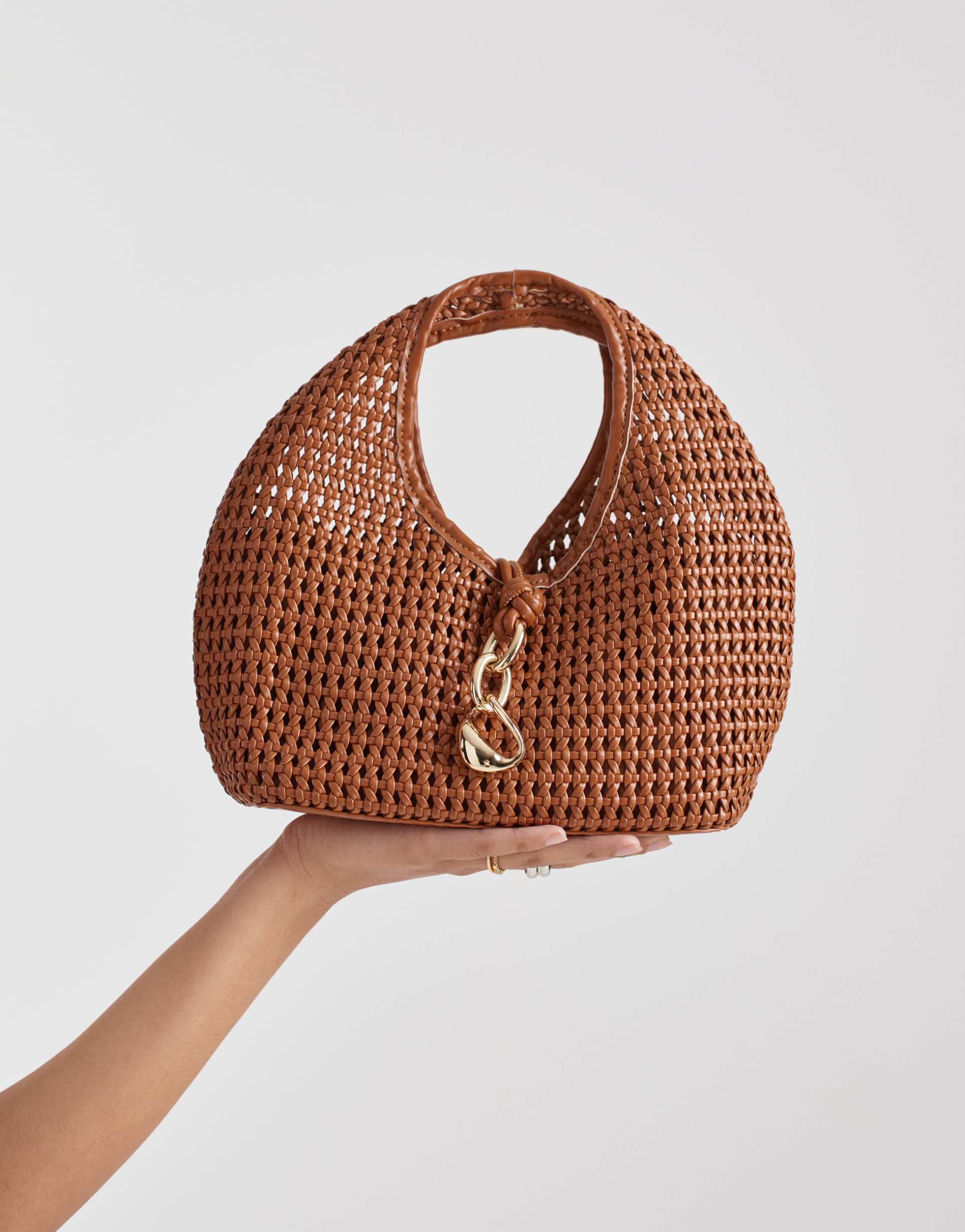 dolce vita dahlia woven clutch purse with gold-tone hardware in tan