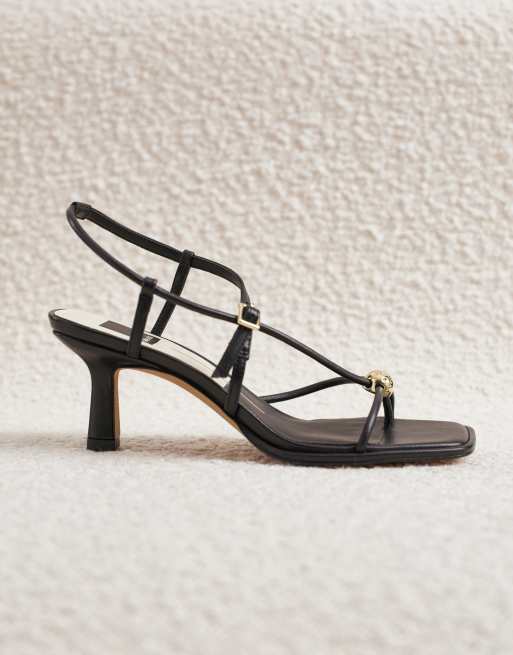 Dolce Vita Mylee strappy mid heel sandals with gold hardware in black leather, 2 of 4