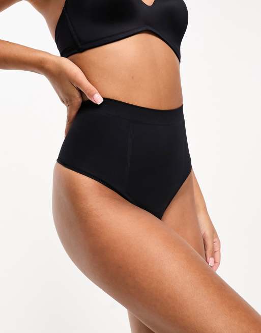 Dorina - Absolute Sculpt - Naadloze sterk corrigerende string met hoge taille in zwart