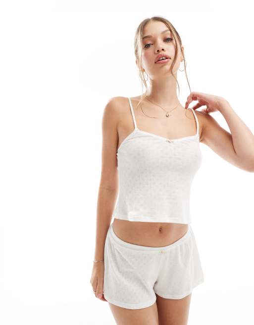 Dorina - Elfenbensfarvet camisole i pointelle med lyserød rosendetalje