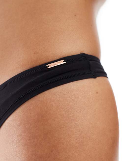 Dorina – Essential – Mix & Match – String-Tanga in Schwarz mit hohem Beinausschnitt und abfallendem Design vorne, 3 von 4