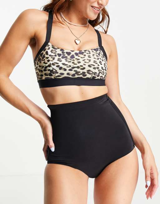 Dorina Javari polyester blend lightly padded sports bra in animal print