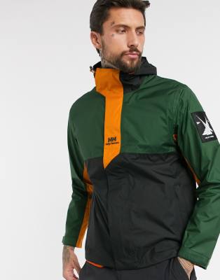 фото Дождевик цвета хаки с оранжевыми вставками helly hansen-зеленый