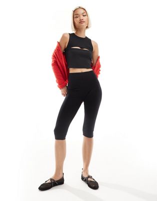 Dr Denim Ainslee sleeveless slim fit cropped tee with cutout chest in off black