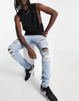 Dr Denim Chase skinny jeans with extreme rips in light wash  - ASOS Price Checker