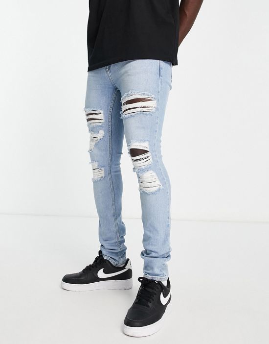 https://images.asos-media.com/products/dr-denim-chase-skinny-jeans-with-extreme-rips-in-light-wash/203056711-4?$n_550w$&wid=550&fit=constrain