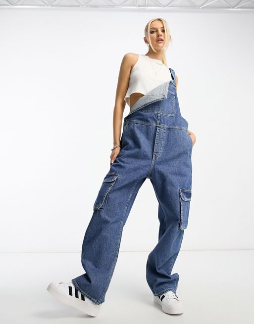 Monki relaxed dungarees with contrast detail in light wash denim