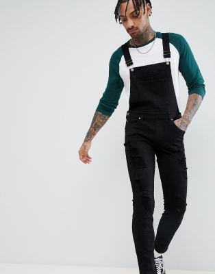 black ripped dungarees