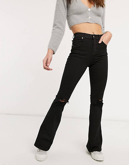 Dr Denim Macy flare jeans with ripped knees in black | ASOS