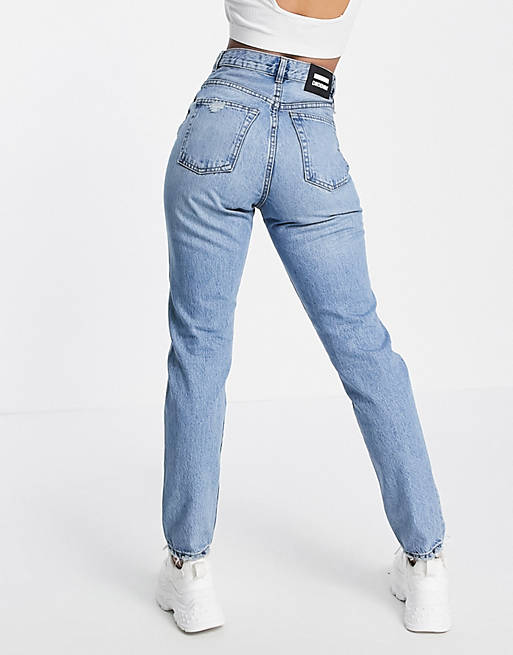 Dr Denim Nora high rise mom jeans with ripped knees in blue | ASOS