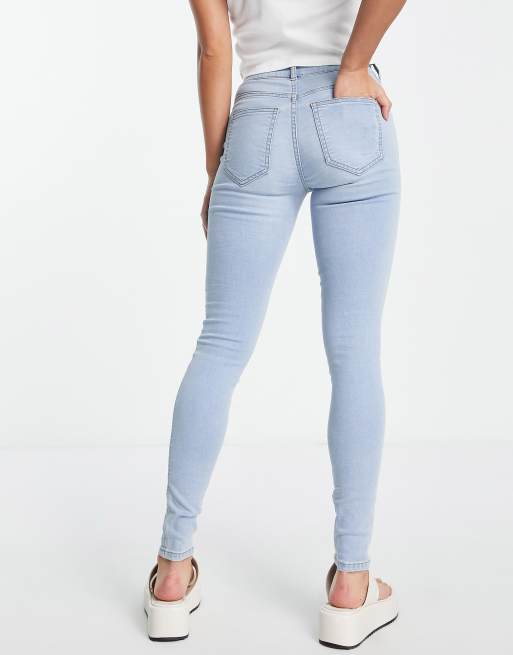 berømt motor leninismen Dr Denim Petite Plenty mid rise super skinny jeans in light wash | ASOS