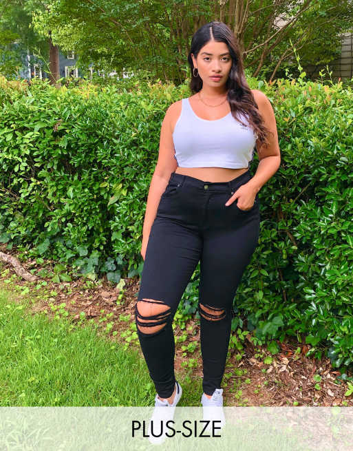 Dr Denim Plus – Lexy – Hautenge Jeans mit mittelhoher Taille und Zierrissen am Knie in Schwarz