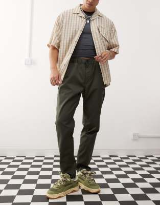 Dr Denim Dr Denim Rush tailored tapered leg chino pant with elastic waistband and drawstring in forest green