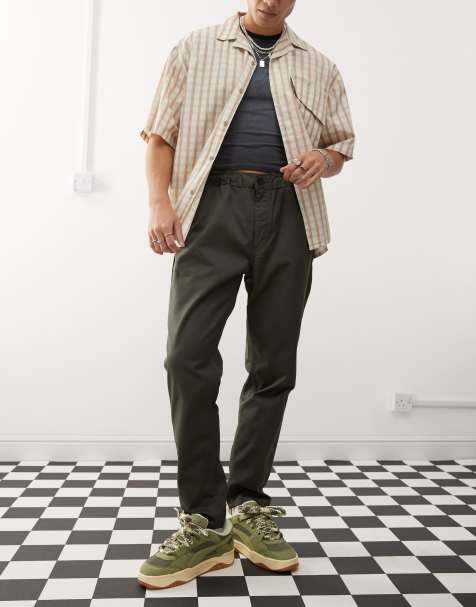 Dr Denim Rush tailored tapered leg chino pant with elastic waistband and drawstring in forest green - view 1