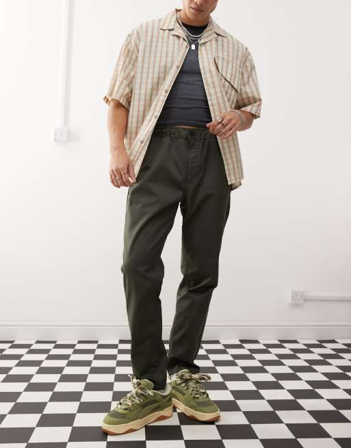 Dr Denim Rush tailored tapered leg chino pants with elastic waistband and drawstring in forest green